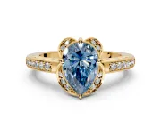 Floral Engagement Ring Setting for Fancy Blue Pear-Shaped Center with Four Accent Clusters and Prong Head in Yellow Gold