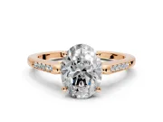 Solitaire Engagement Ring Setting for Oval Center with Channel Accents and Prong Head in Rose Gold
