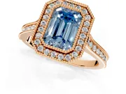 Halo Engagement Ring Setting for Fancy Blue Emerald Cut Center with Milgrain Pave Band and Bezel Head in Rose Gold