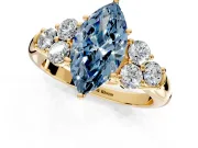 Cluster Engagement Ring Setting for Fancy Blue Marquise Center with Round Cut Accent Frame and Prong Head in Yellow Gold