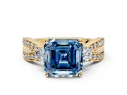 3 Stone Engagement Ring Setting for Fancy Blue Asscher Cut Center with Pave Twist Band and Prong Head in Yellow Gold
