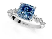 Solitaire Engagement Ring Setting for Fancy Blue Cushion Cut Center with Trailing Leaf Accent Band and Prong Head in Platinum