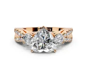 3 Stone Engagement Ring Setting for Heart-Shaped Center with Pave Split Shank and Prong Head in Rose Gold