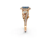 Milgrain Halo Engagement Ring Setting for Fancy Blue Emerald Cut Center with Shoulder Bezels and Prong Head in Rose Gold