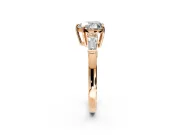 3 Stone Engagement Ring Setting for Heart-Shaped Center with Baguette Accents and Prong Head in Rose Gold