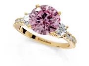 3 Stone Engagement Ring Setting for Fancy Pink Round Cut Center with Round Cut Side Accents and Prong Head in Yellow Gold