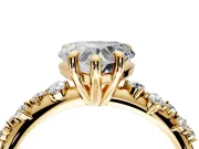 Solitaire Engagement Ring Setting for Heart-Shaped Center with Trailing Leaf Accent Band and Prong Head in Yellow Gold