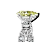 3 Stone Engagement Ring Setting for Fancy Yellow Pear-Shaped Center with Pave Twist Band and Prong Head in Platinum