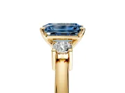 3 Stone Engagement Ring Setting for Fancy Blue Emerald Cut Center with Wide Plain Band and Prong Head in Yellow Gold