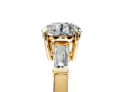 3 Stone Engagement Ring Setting for Round Cut Center with Baguette Accents and Prong Head in Yellow Gold