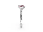 3 Stone Engagement Ring Setting for Fancy Pink Pear-Shaped Center with Tapered Baguettes, Plain Band and Prong Head in Sterling Silver
