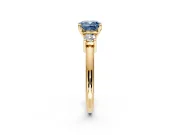 3 Stone Engagement Ring Setting for Fancy Blue Cushion Cut Center with Wide Plain Band and Prong Head in Yellow Gold