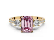 3 Stone Engagement Ring Setting for Fancy Pink Emerald Cut Center with Round Cut Side Accents and Prong Head in Yellow Gold
