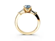 3 Stone Engagement Ring Setting for Fancy Blue Oval Center with Channel Baguette Accents and Prong Head in Yellow Gold