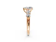 5 Stone Engagement Ring Setting for Pear-Shaped Center with Graduated Accents and Prong Head in Rose Gold