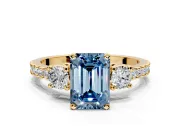 3 Stone Engagement Ring Setting for Fancy Blue Emerald Cut Center with Round Cut Side Accents and Prong Head in Yellow Gold