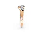 3 Stone Engagement Ring Setting for Heart-Shaped Center with Raised Basket Heads and Prong Head in Rose Gold