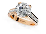 Solitaire Engagement Ring Setting for Round Cut Center with Channel Band and Double Claw Prong Head in Rose Gold