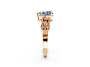 Leaf Engagement Ring Setting for Fancy Blue Pear-Shaped Center with Milgrain Accent Band and Prong Head in Rose Gold