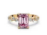 Solitaire Engagement Ring Setting for Fancy Pink Emerald Cut Center with Trailing Leaf Accent Band and Prong Head in Yellow Gold