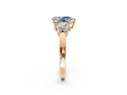 Solitaire Engagement Ring Setting for Fancy Blue Pear-Shaped Center with Marquise Flower Shoulders and Prong Head in Rose Gold