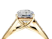 Solitaire Engagement Ring Setting for Radiant Cut Center with Round Cut Channel Band and Prong Head in Yellow Gold