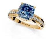 Solitaire Engagement Ring Setting for Fancy Blue Cushion Cut Center with Raised Channel Band and Prong Head in Yellow Gold