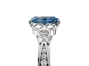 Cluster Engagement Ring Setting for Fancy Blue Emerald Cut Center with Bezel Accent Clusters and Prong Head in White Gold