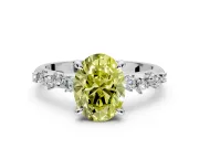 Solitaire Engagement Ring Setting for Fancy Yellow Oval Center with Trailing Leaf Accent Band and Prong Head in Sterling Silver