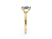 Minimalist Solitaire Engagement Ring Setting for Fancy Blue Pear-Shaped Center with Thin Band and Prong Head in Yellow Gold