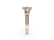 Channel-Set Engagement Ring Setting for Pear-Shaped Center with Baguette Band and Prong Head in Rose Gold