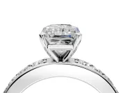 Solitaire Engagement Ring Setting for Radiant Cut Center with Channel-Set Accents and Prong Head in Platinum