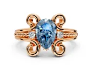 Solitaire Engagement Ring Setting for Fancy Blue Pear-Shaped Center with Twisted Band and Scroll Prong Head in Rose Gold