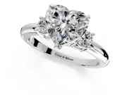 3 Stone Engagement Ring Setting for Heart-Shaped Center with Wide Plain Band and Prong Head in Platinum