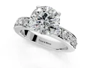 Solitaire Engagement Ring Setting for Round Cut Center with Channel-Set Accents and Prong Head in White Gold