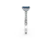 Solitaire Engagement Ring Setting for Fancy Blue Emerald Cut Center with Round Cut Pave Band and Prong Head in White Gold