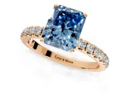 Open Basket Engagement Ring Setting for Fancy Blue Radiant Cut Center with Pave Band and Prong Head in Rose Gold