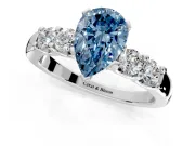 5 Stone Engagement Ring Setting for Fancy Blue Pear-Shaped Center with Plain Band and Prong Head in Platinum