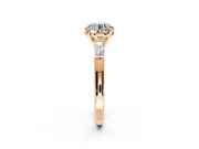 3 Stone Engagement Ring Setting for Round Cut Center with Tapered Baguettes, Plain Band and Prong Head in Rose Gold