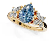 Floral Engagement Ring Setting for Fancy Blue Pear-Shaped Center with Marquise Cluster Shoulders and Prong Head in Yellow Gold