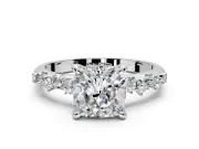 Solitaire Engagement Ring Setting for Cushion Cut Center with Trailing Leaf Accent Band and Prong Head in White Gold