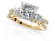 3 Stone Engagement Ring Setting for Princess Cut Center with Pave Split Shank and Prong Head in Yellow Gold
