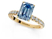 Open Basket Engagement Ring Setting for Fancy Blue Emerald Cut Center with Pave Band and Prong Head in Yellow Gold