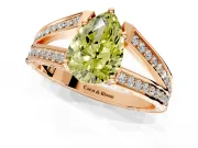Split Shank Engagement Ring Setting for Fancy Yellow Pear-Shaped Center with Pave Split Shank and Prong Head in Rose Gold