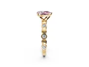 Solitaire Engagement Ring Setting for Fancy Pink Pear-Shaped Center with Beaded Bezel Station Band and Prong Head in Yellow Gold