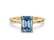 Solitaire Engagement Ring Setting for Fancy Blue Emerald Cut Center with Bamboo Band and Prong Head in Yellow Gold