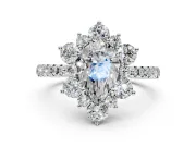 Floral Halo Engagement Ring Setting for Pear-Shaped Center with Pave Accents and Prong Head in Platinum