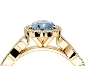 Halo Engagement Ring Setting for Fancy Blue Pear-Shaped Center with Pave and Plain Twist Band and Prong Head in Yellow Gold