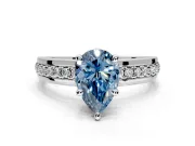 Solitaire Engagement Ring Setting for Fancy Blue Pear-Shaped Center with Raised Channel Band and Prong Head in White Gold