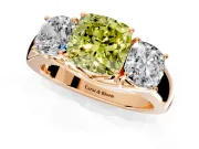 3 Stone Engagement Ring Setting for Fancy Yellow Cushion Cut Center with Raised Basket Heads and Prong Head in Rose Gold
